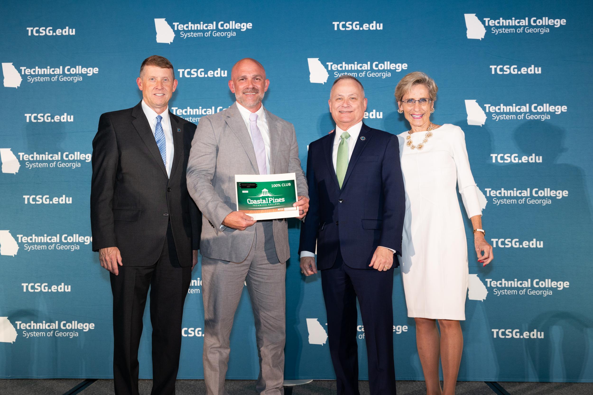 Photo for Coastal Pines Local Board Receives 100% Club Award